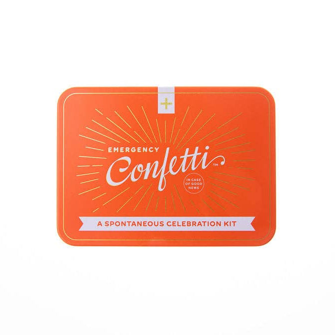 Orange confetti kit packaging with white text on a white background