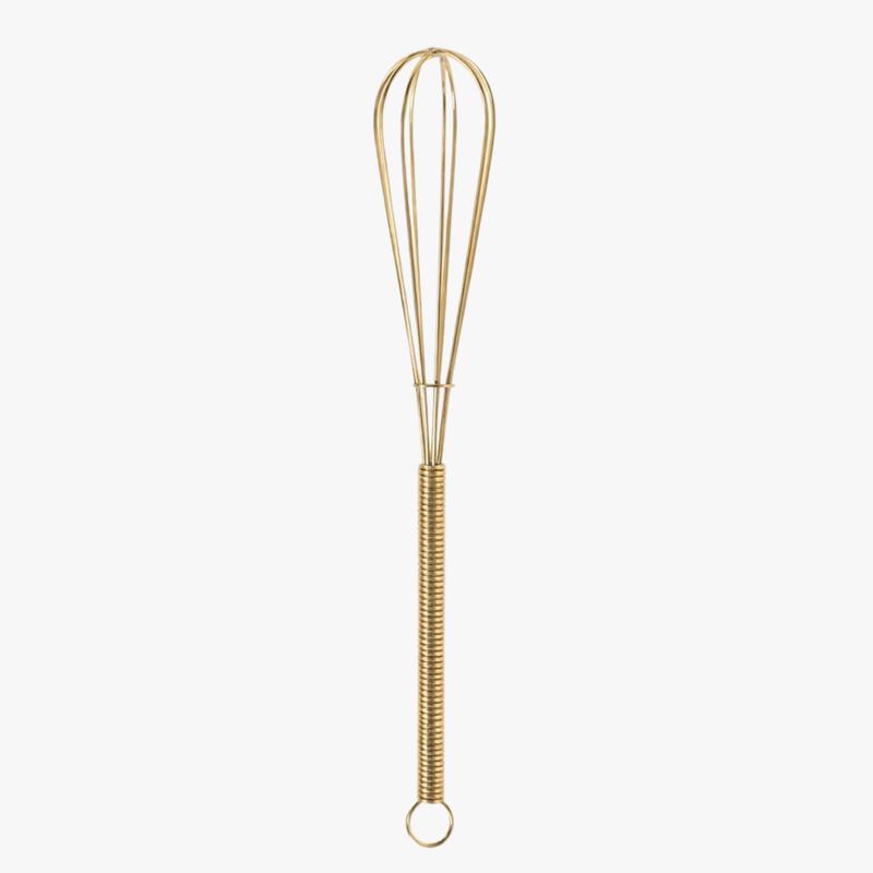 Gold mini wire whisk on white background