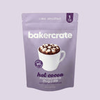 Bakercrate hot cocoa microwavable mug cake pouch on lavender background