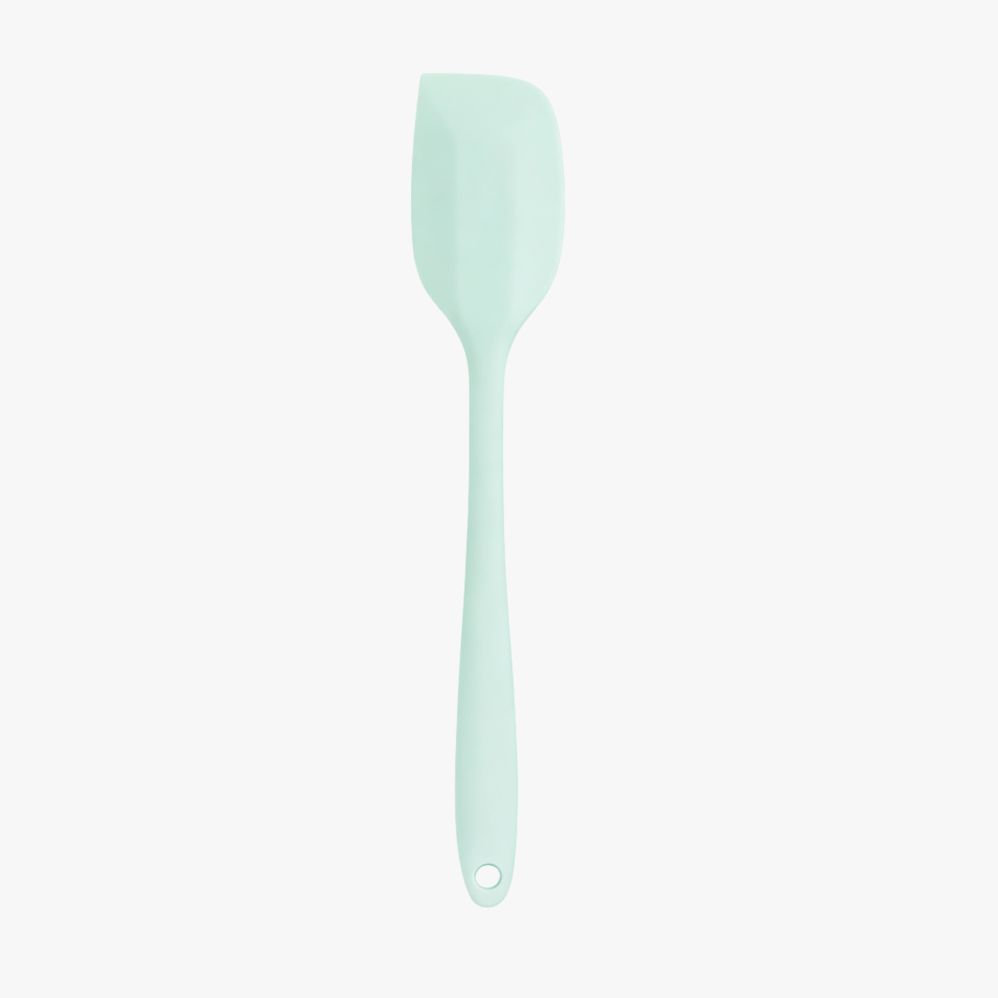 Mint mini silicone spatula on white background