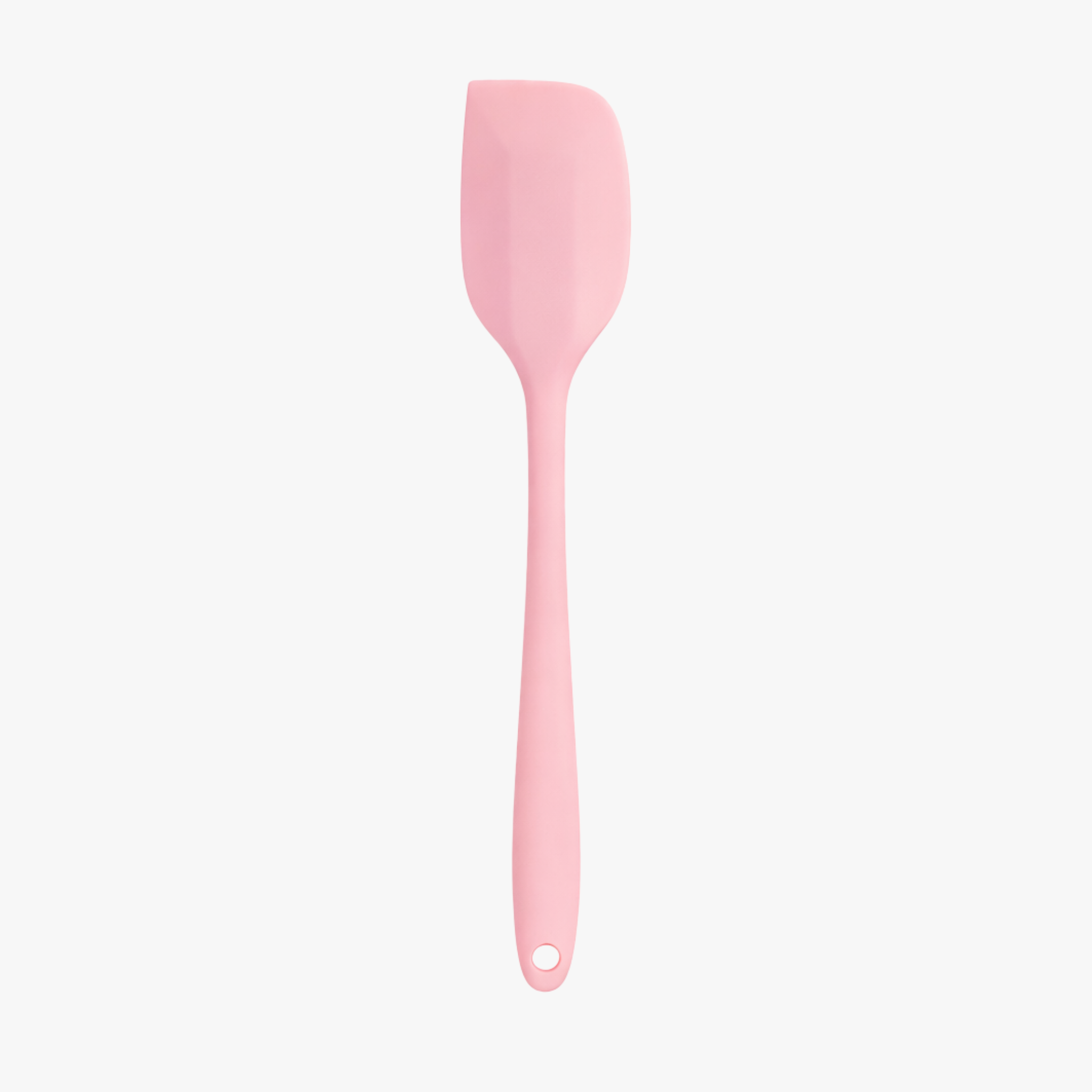 Pink mini silicone spatula on white background