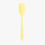 Yellow mini silicone spatula on white background