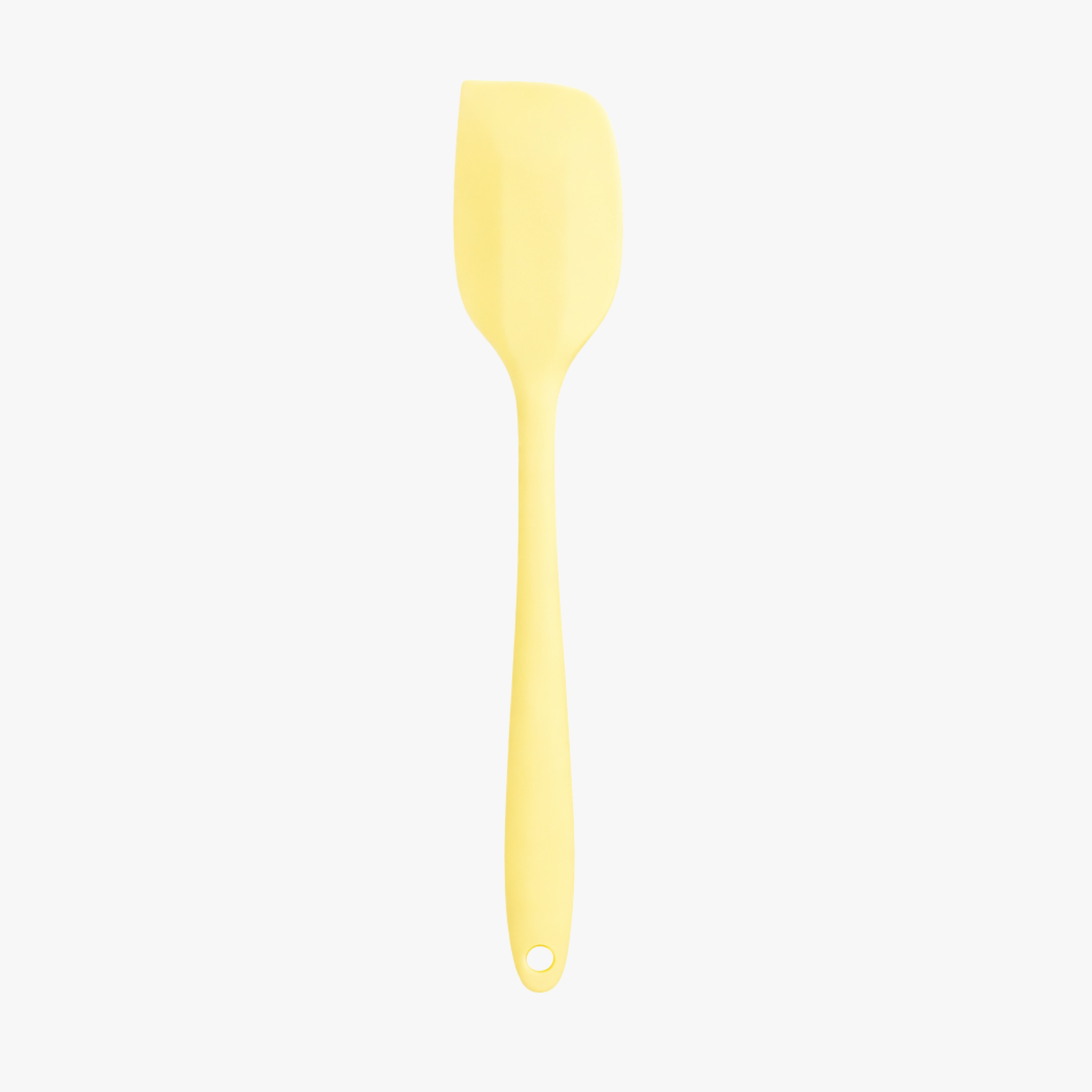 Yellow mini silicone spatula on white background